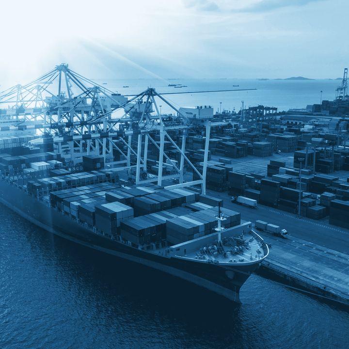 Container ship alongside a terminal at first light